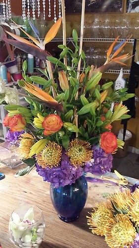 proteas birds lilies