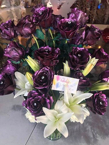 ONE DOZEN METALLIC PURPLE ROSES WITH WHITE LIIES